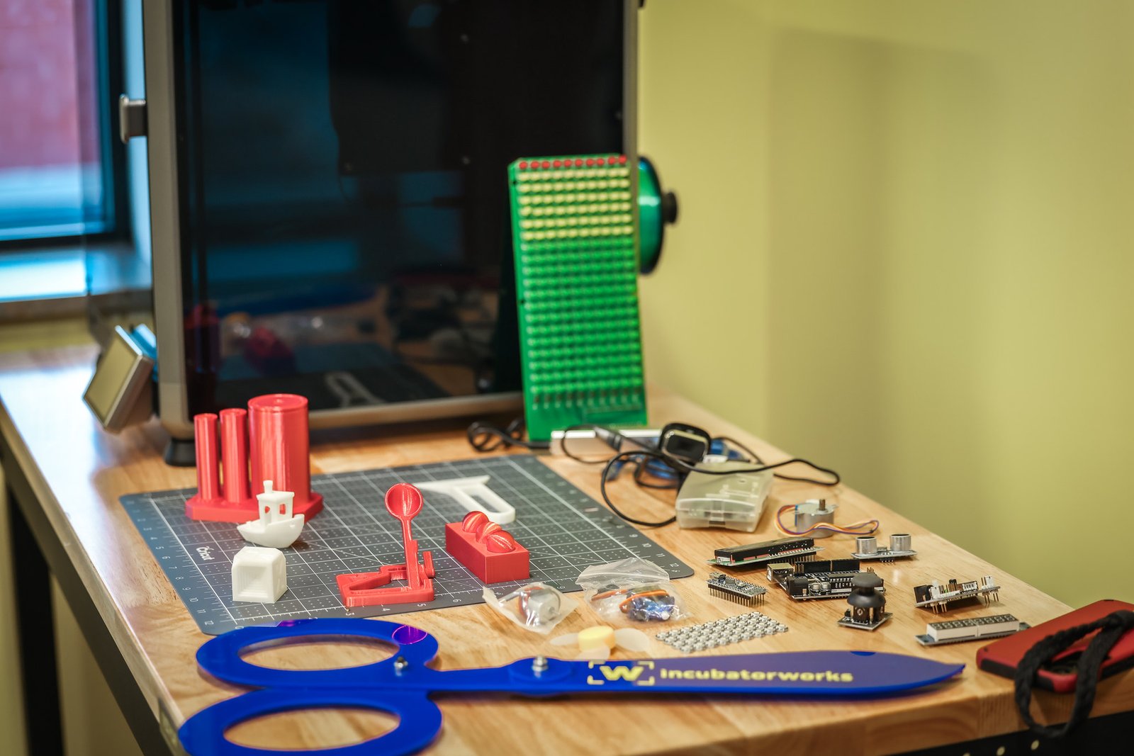 Elmira Makers makerspace at IncubatorWorks in Elmira, New York, showing large-format environmental graphics