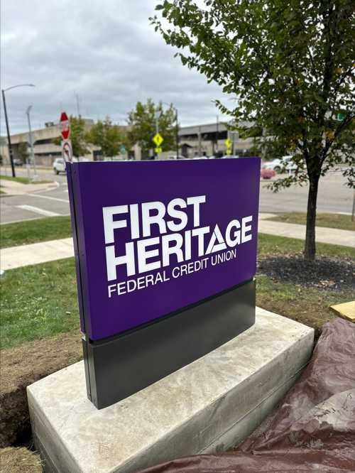 First Heritage Bank illuminated sign lit up at night