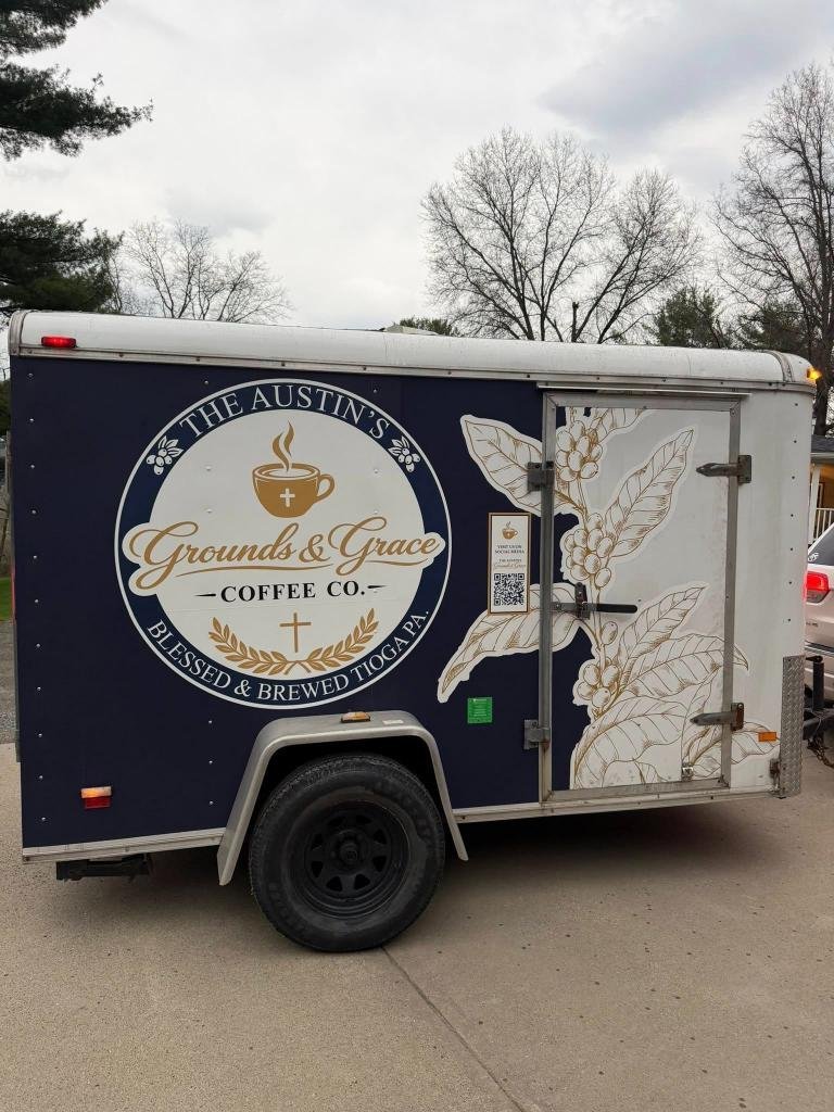 Grounds & Grace Coffee storefront entrance sign