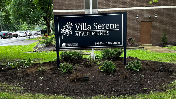 Villa Serene Apartments community entrance monument setting